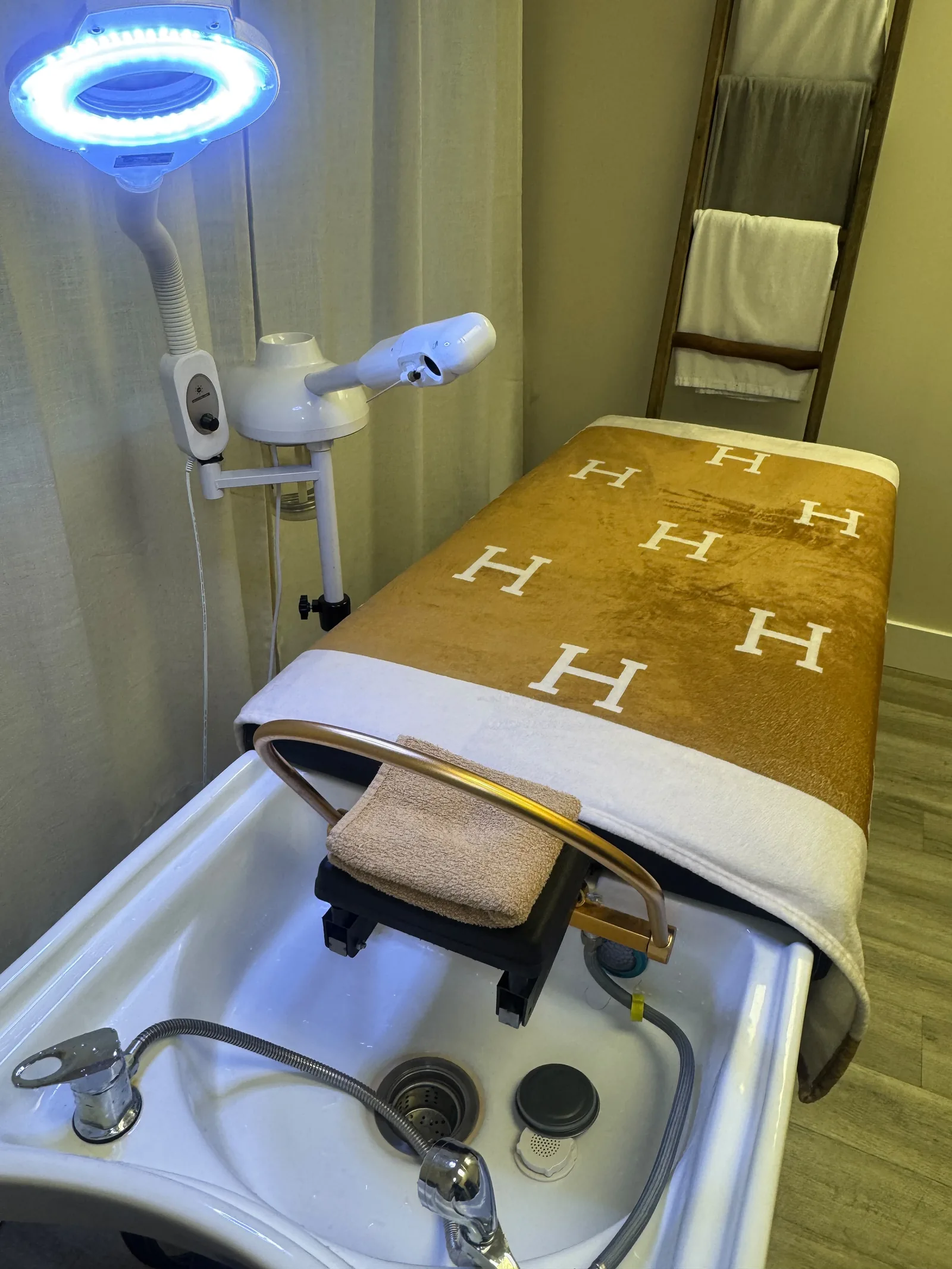 Facial treatment bed prepared for a visit