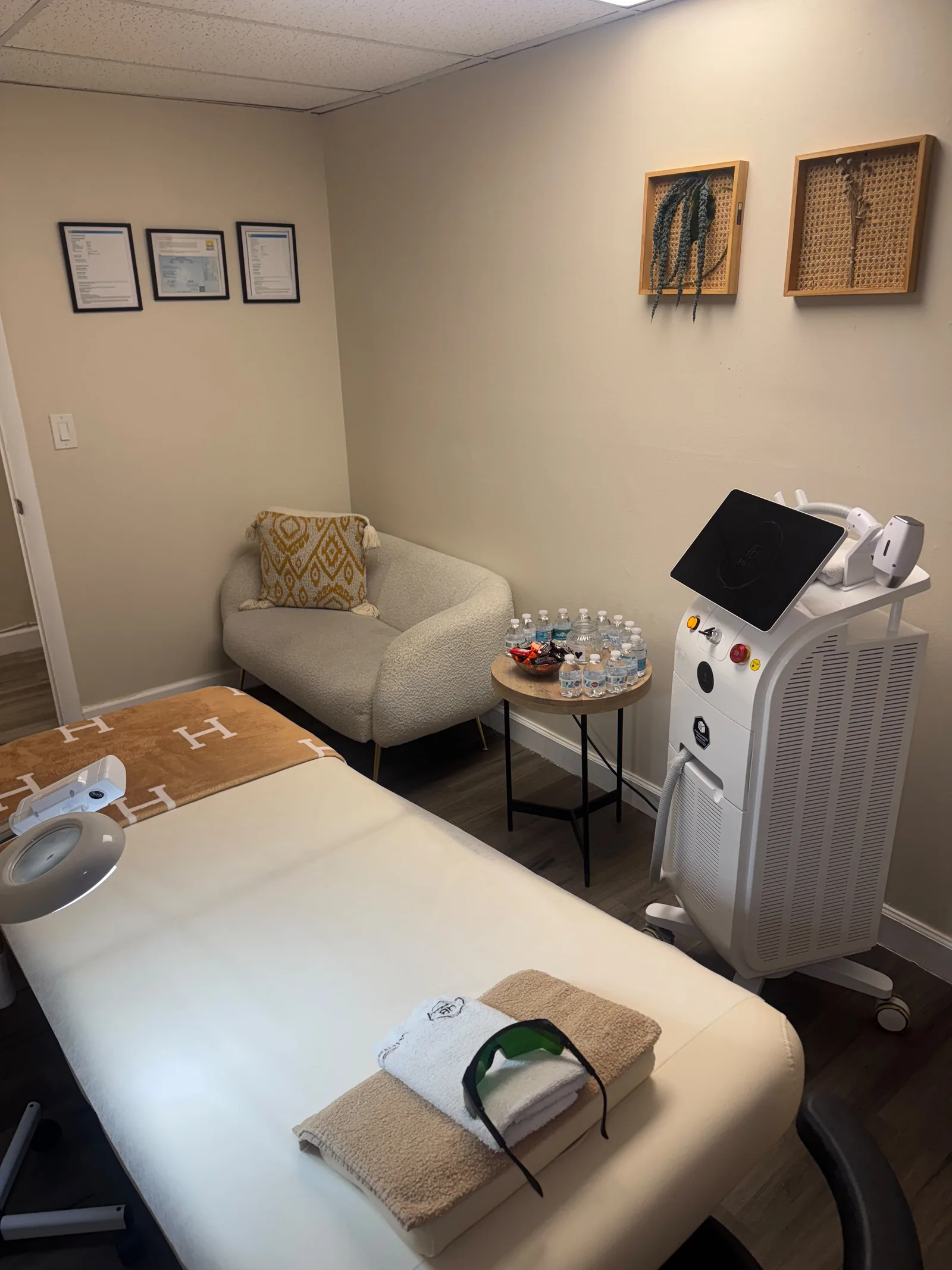 Facial room with treatment bed and skincare equipment
